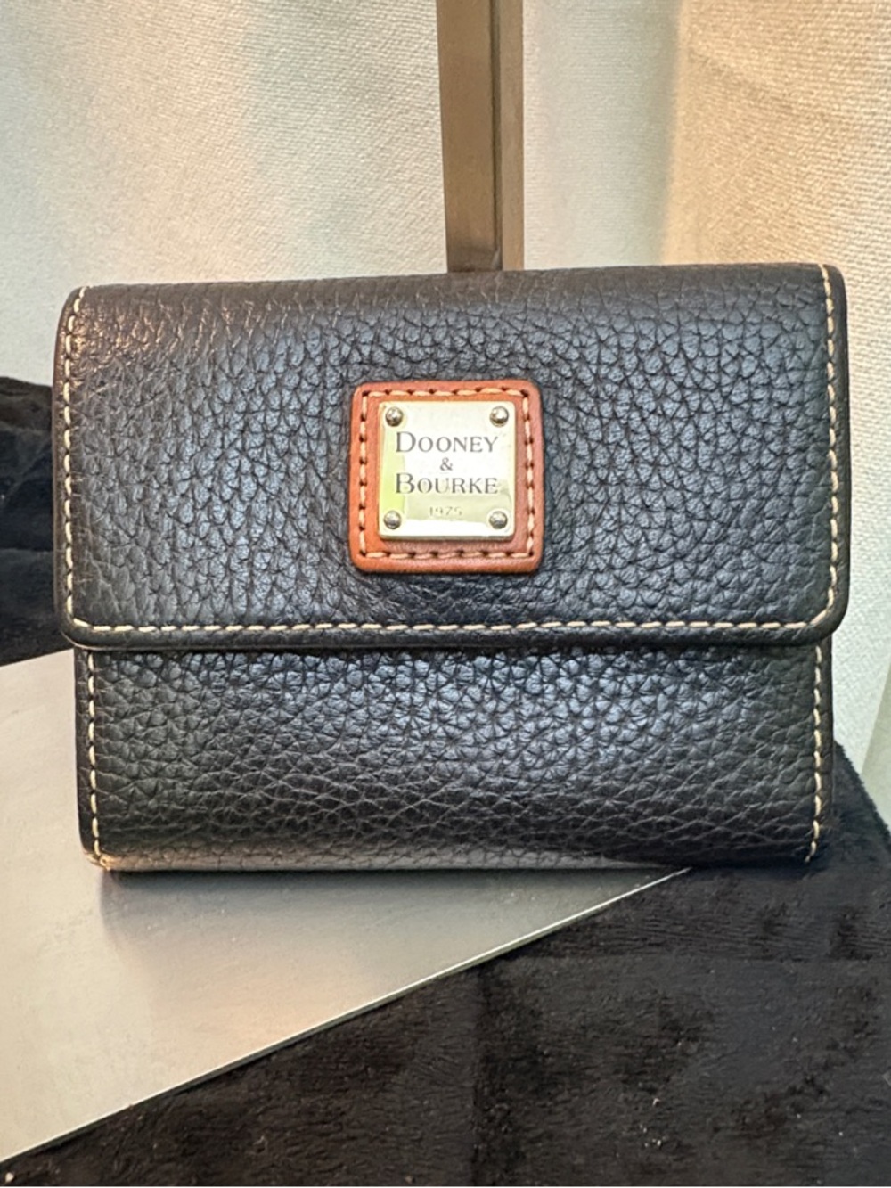 Dooney & Bourke Black Pebbled Leather Wallet with Tan Trim